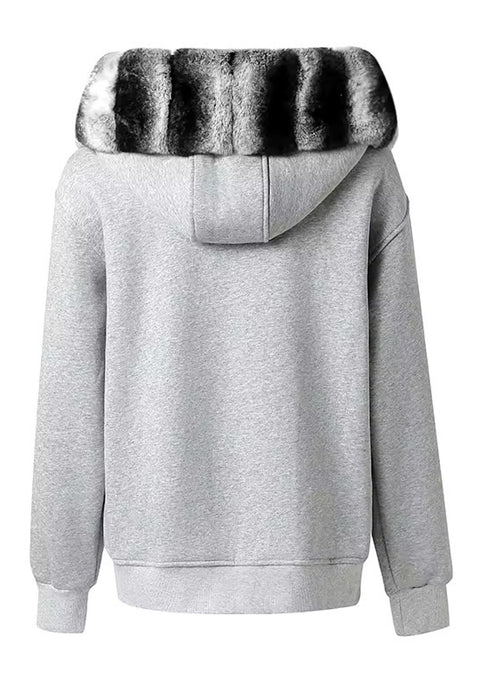 Close-up of a plush Rex Rabbit fur hoodie, showcasing its rich texture and practical design with front zip closure.