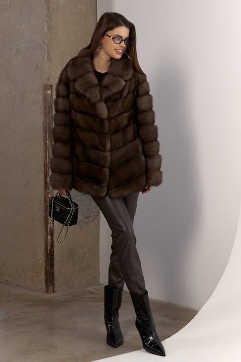 Elegant short brown sable coat styled for chic cold-weather fashion.