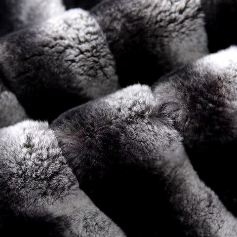 Close up of genuine Rex Rabbit fur, designed with a detachable lining for easy maintenance and insulation.