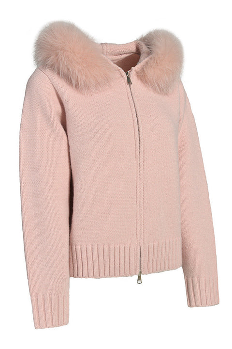 Delicate pink cashmere coat featuring voluminous matching fox fur, combining comfort and luxury.